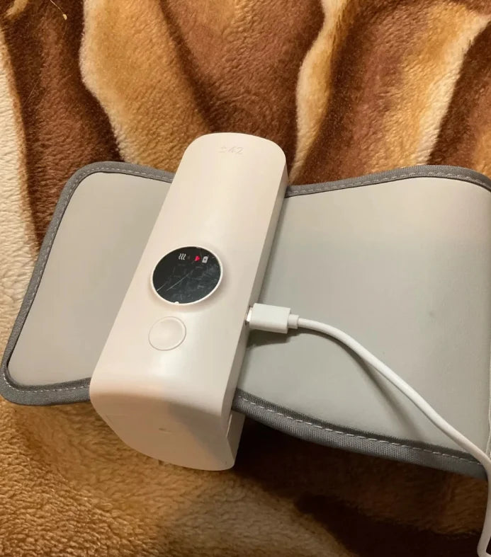 baby bottle warmer with a cable on a brown textured surface